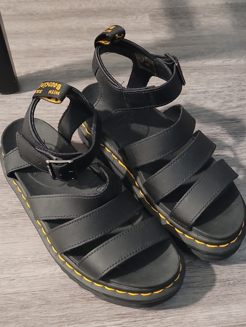 Dr. Martens Blair Black Leather Strappy Platform Sandals with Yellow Stitching